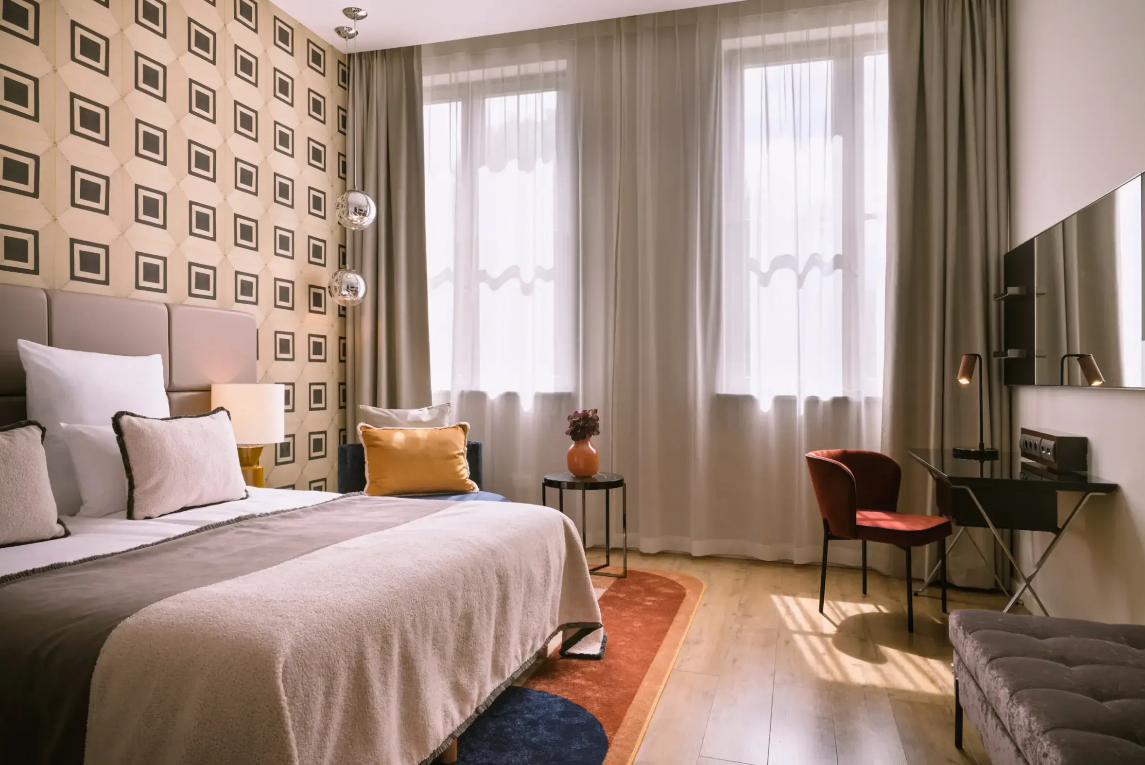 Bright Scandinavian standard room with soft natural light and minimalist design